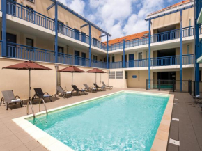 Spacious apartment with heated pool
